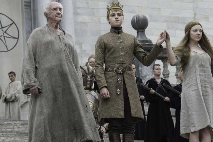 The High Sparrow stands beside King Tommen Baratheon and Queen Margaery Tyrell