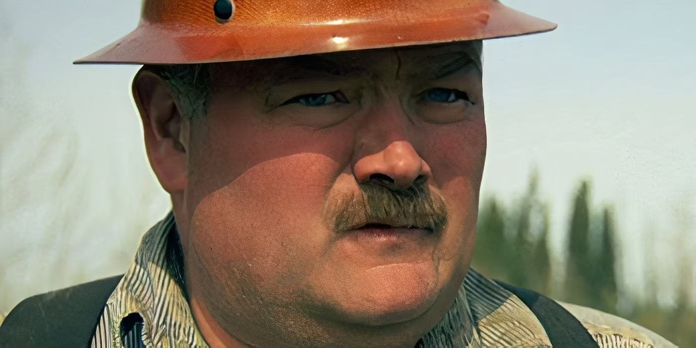 Gene Cheeseman in hat, outside, from Gold-Rush.