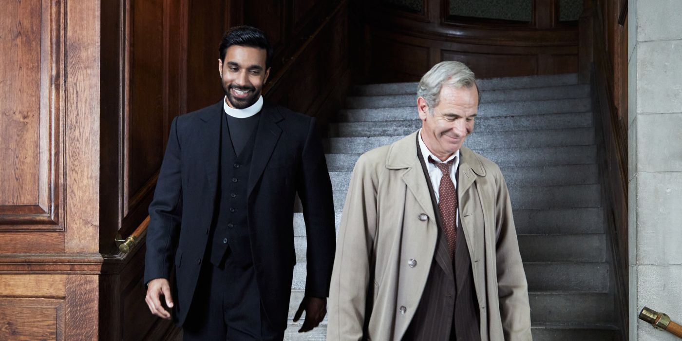 Rishi Nair and Robson Green descend stairs with smiles on their faces in Grantchester Season 10