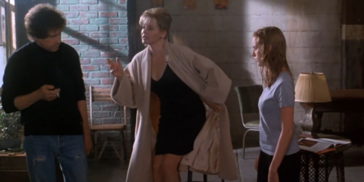 Jean Smart and Sarah Polley have a conversation in a room with brick walls in Guinevere.