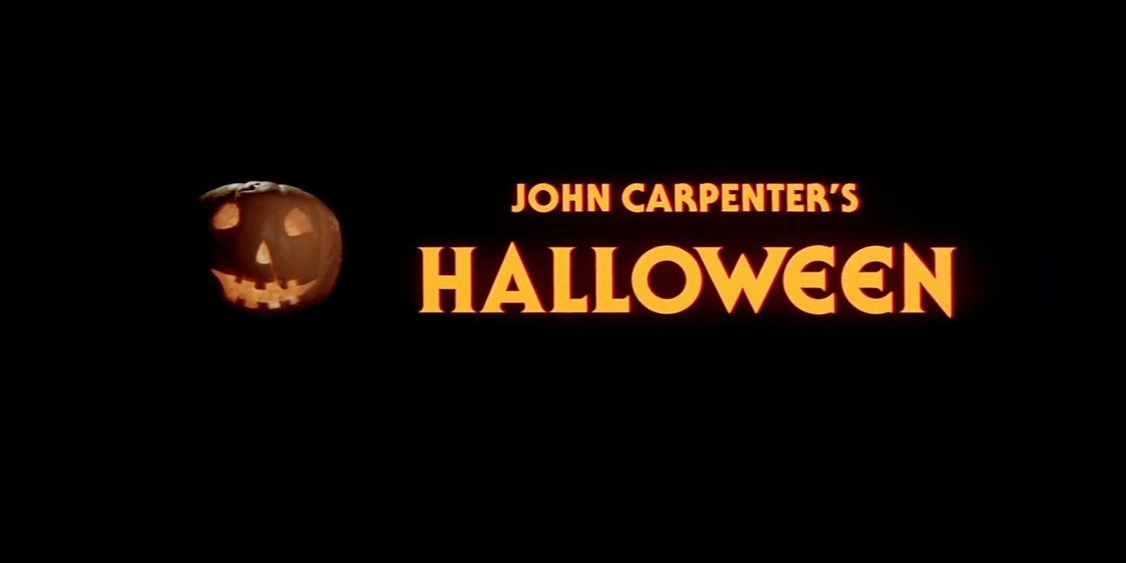 Halloween credits with a pumpkin in a black background