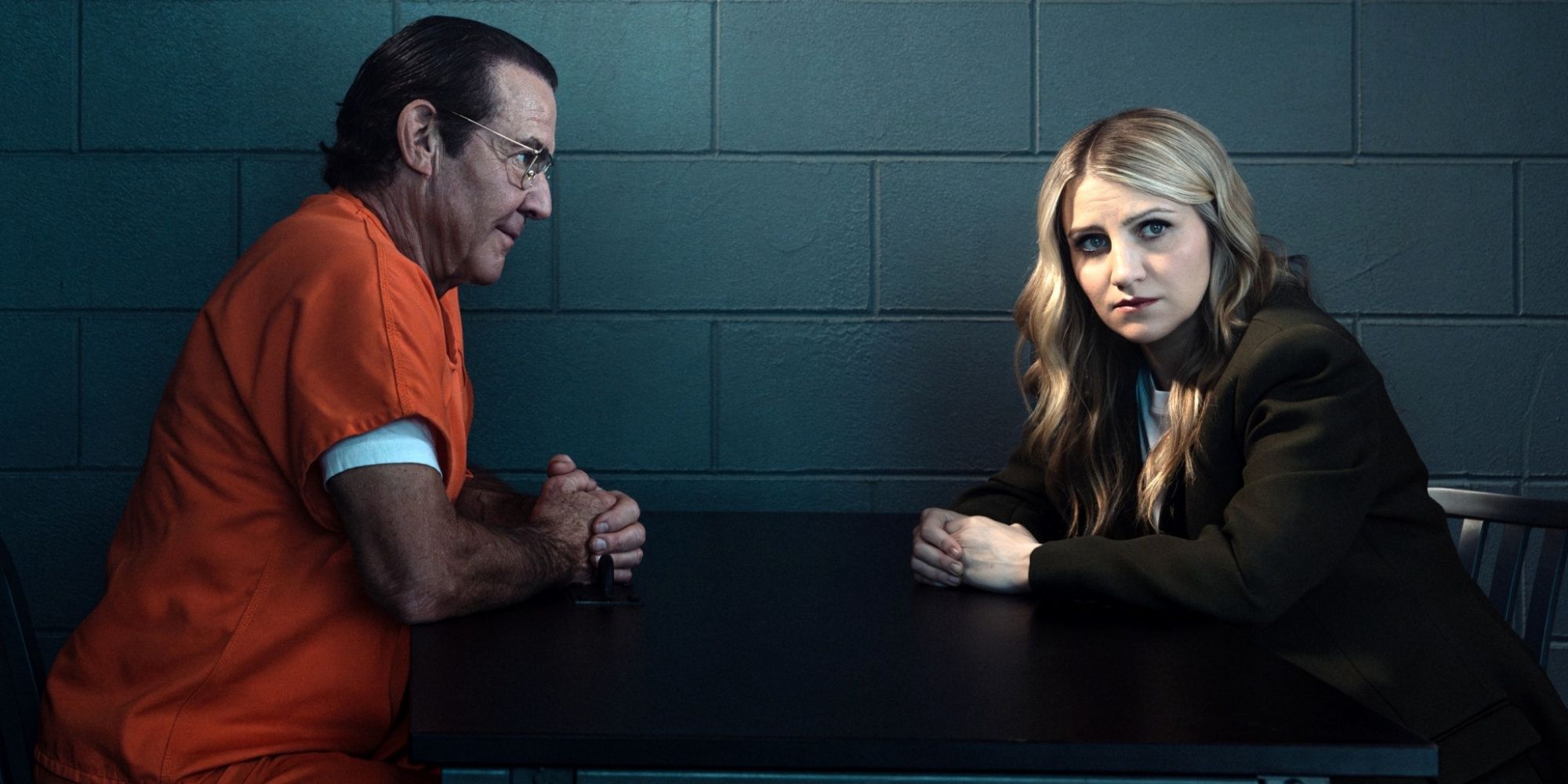 Annaleigh Ashford as Melissa Reed in prison at a table with Dennis Quaid as Keith Jesperson in Happy Face
