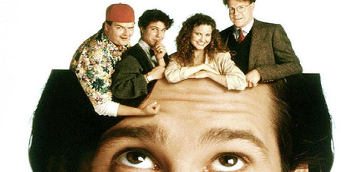 The top of a man's head looking up at four people inside the skull in Herman's Head.