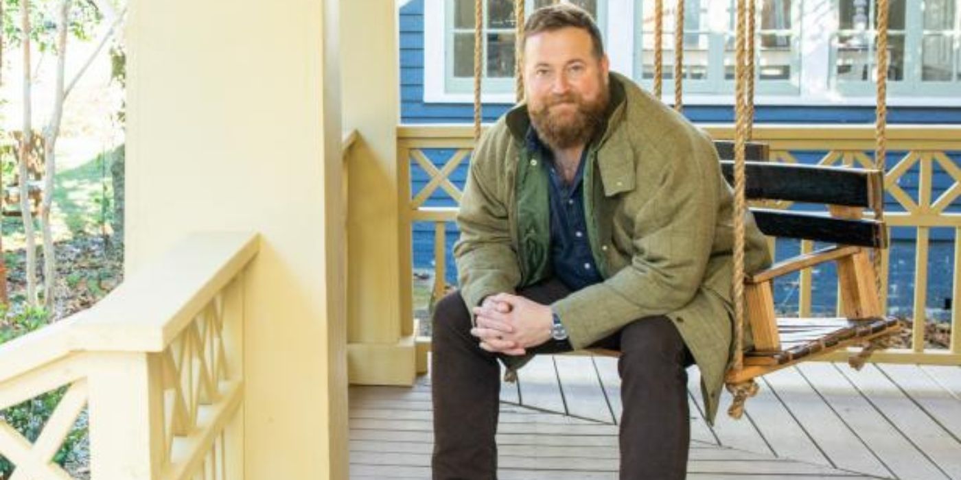 Ben Napier sits on a porch swing for a promo for &lsquo;Home Town.'