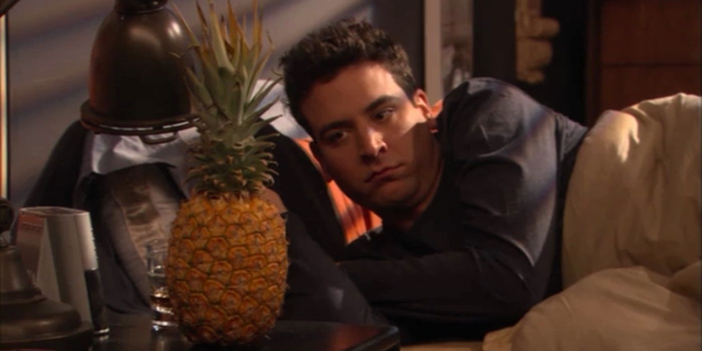 Ted waking up in bed next to a pineapple on his night stand in HIMYM