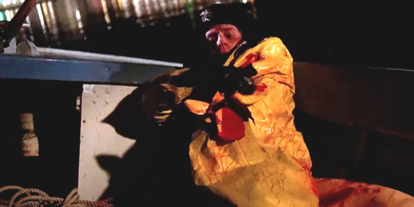 Sean Brody (Mitchell Anderson) grabs at his bloody coat where his arm used to be in &lsquo;Jaws: The Revenge&rsquo;