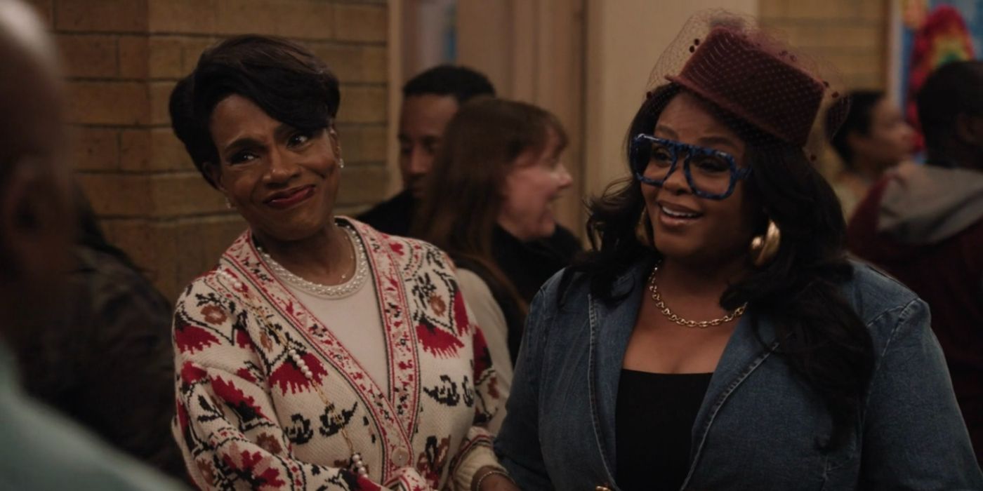 Barbara Howard played by Sheryl Lee Ralph next to Jill Scott in a crowded hallway in &ldquo;Abbott Elementary.&quot;