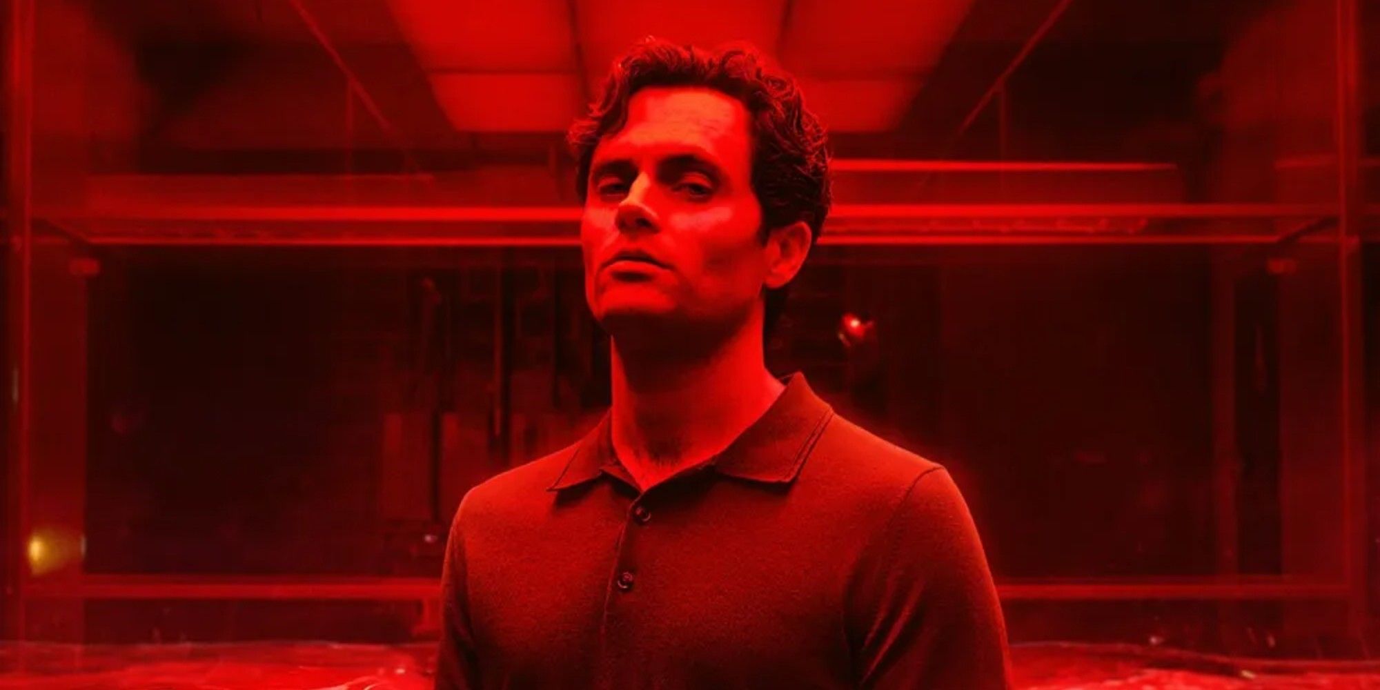 The promo photo for You Season 5: Joe Goldberg in the cage, tinted in red.