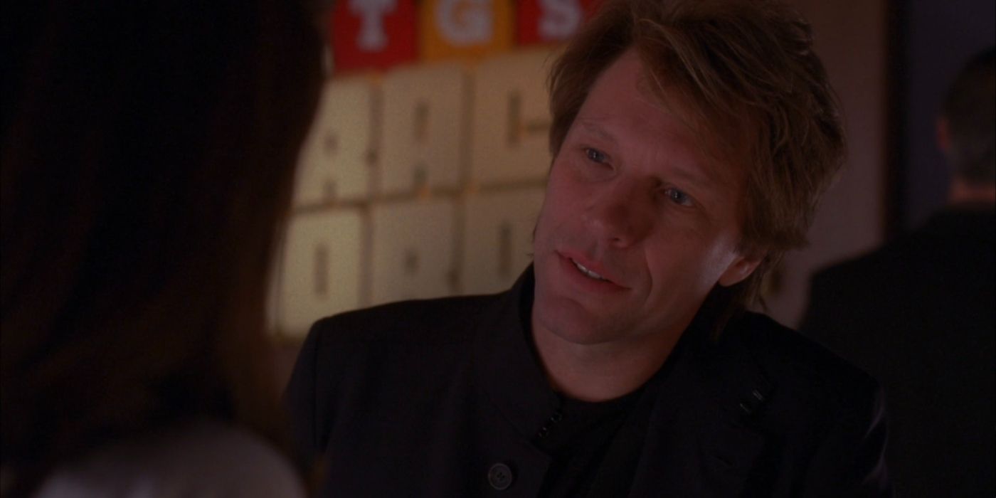 Jon Bon Jovi looking at Liz Lemon (played by Tina Fey), though only the back of her head is visible, and some of it is cut off, on &ldquo;30 Rock.&quot;
