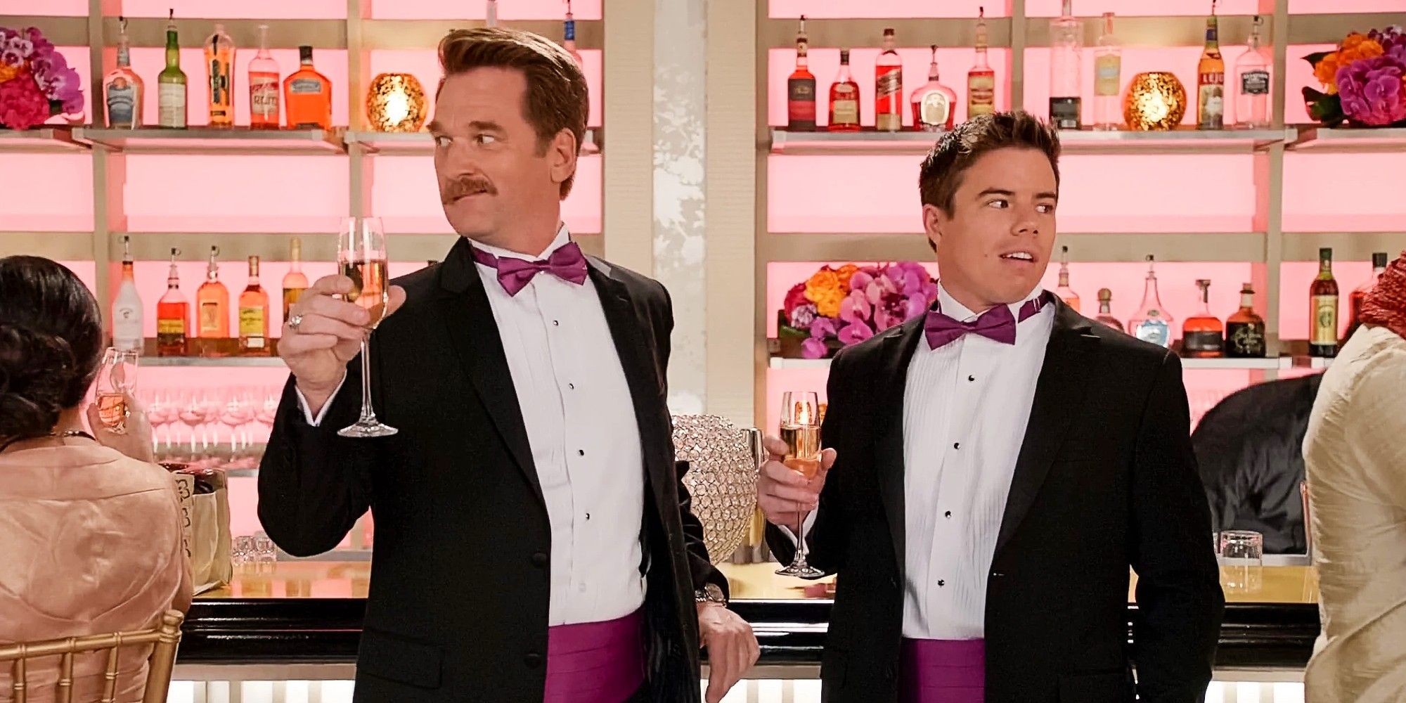 Darryl Whitefeather and Whi-Jo (White Josh) in tuxedos at a bar in Crazy Ex-Girlfriend Season 1.