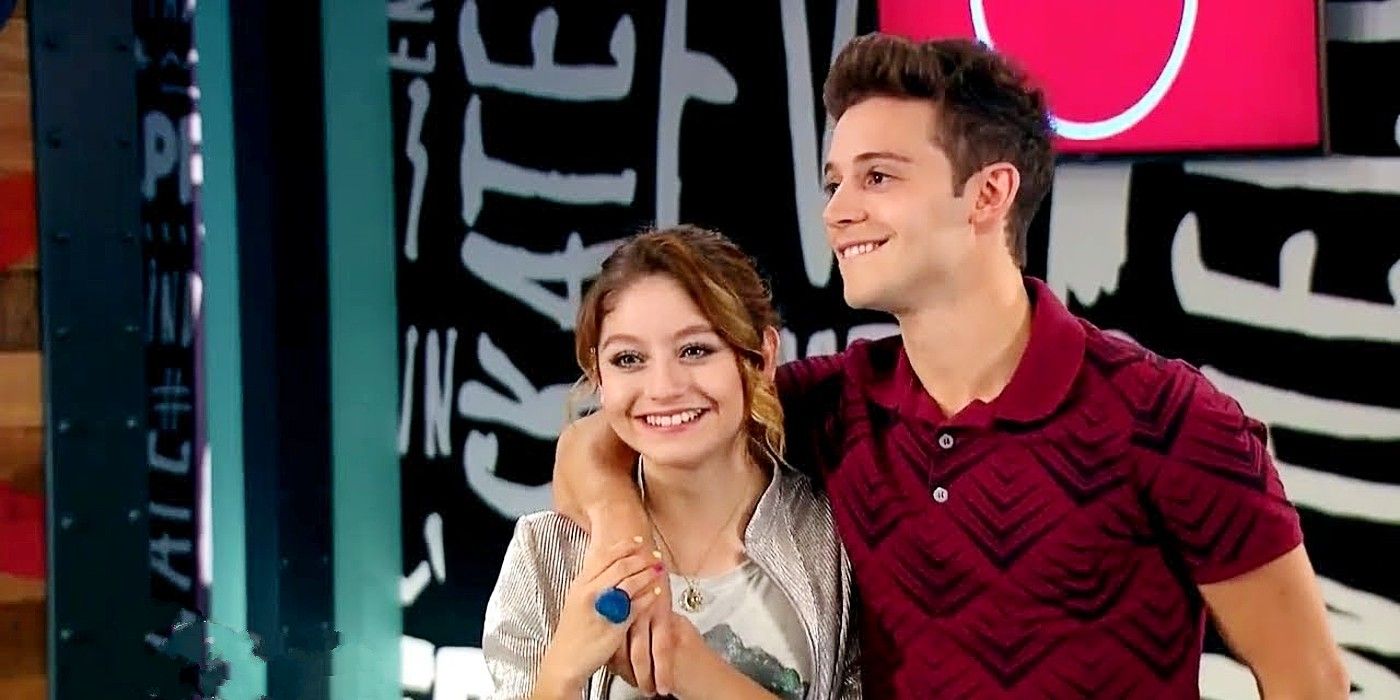 Matteo with his arm around Luna as they both smile in Soy Luna.