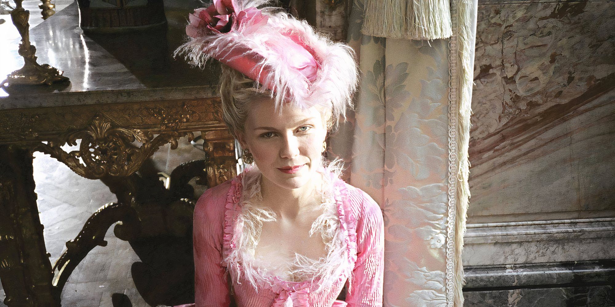 Marie Antoinette wearing a pink gown in Marie Antoinette