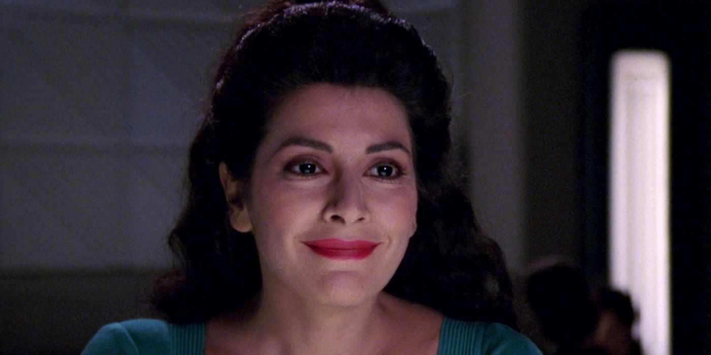 Marina Sirtis as Deanna Troi smiling in &lsquo;Star Trek The Next Generation&rsquo;.