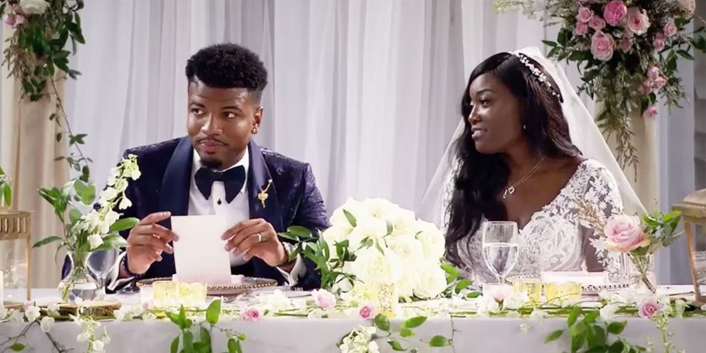 Chris and Paige sit at the head table at their wedding banquet on Season 12 of Married at First Sight.