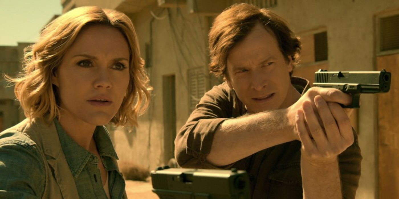 Lola and Owen point guns at something off-camera in Medical Police.