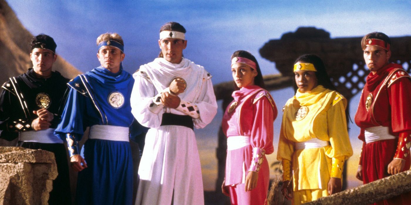 The Power Rangers standing together in Mighty Morphin Power Rangers: The Movie