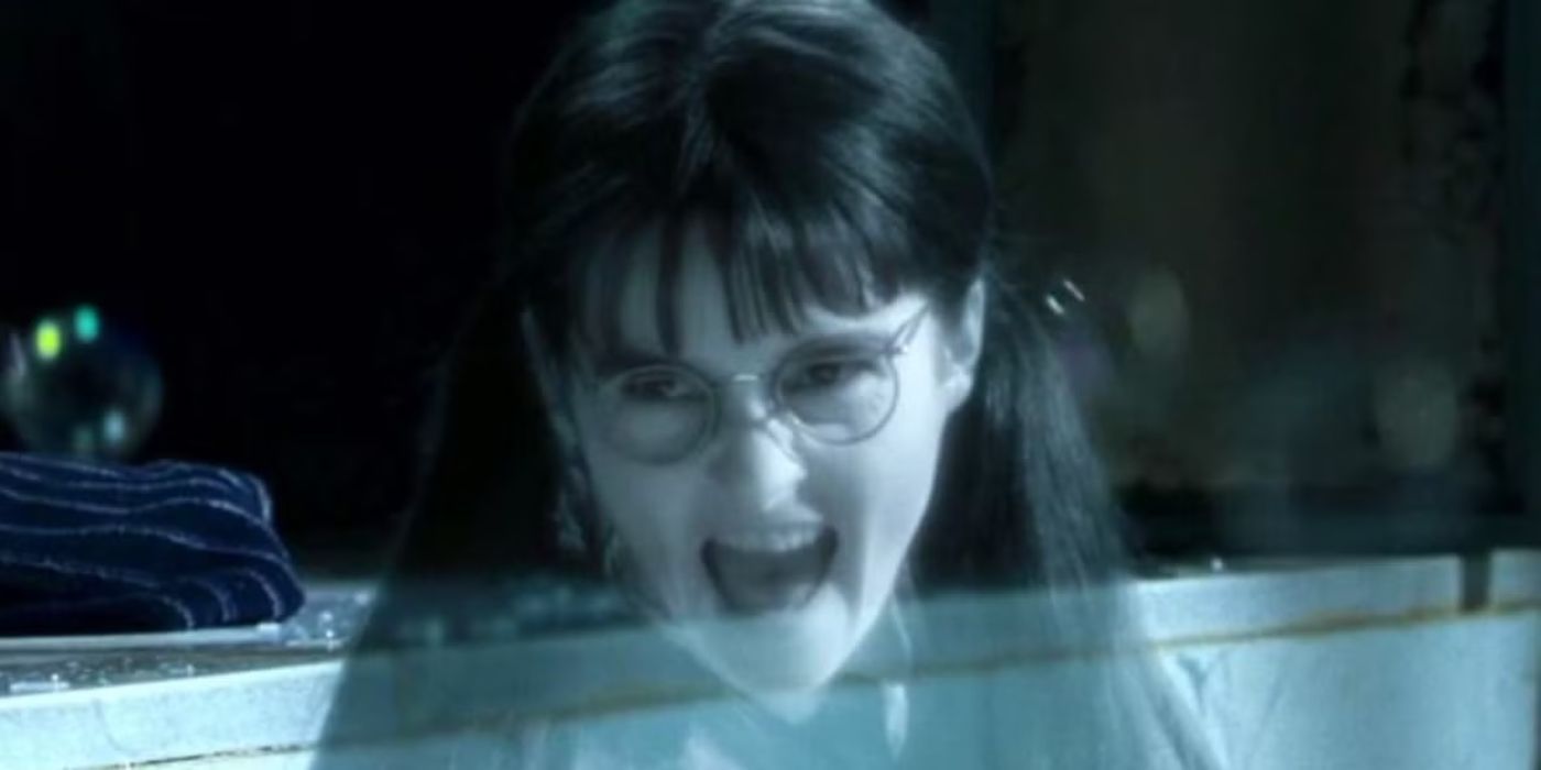 Shirley Henderson as Moaning Myrtle in ghost form, looking very angry in the Harry Potter film series.