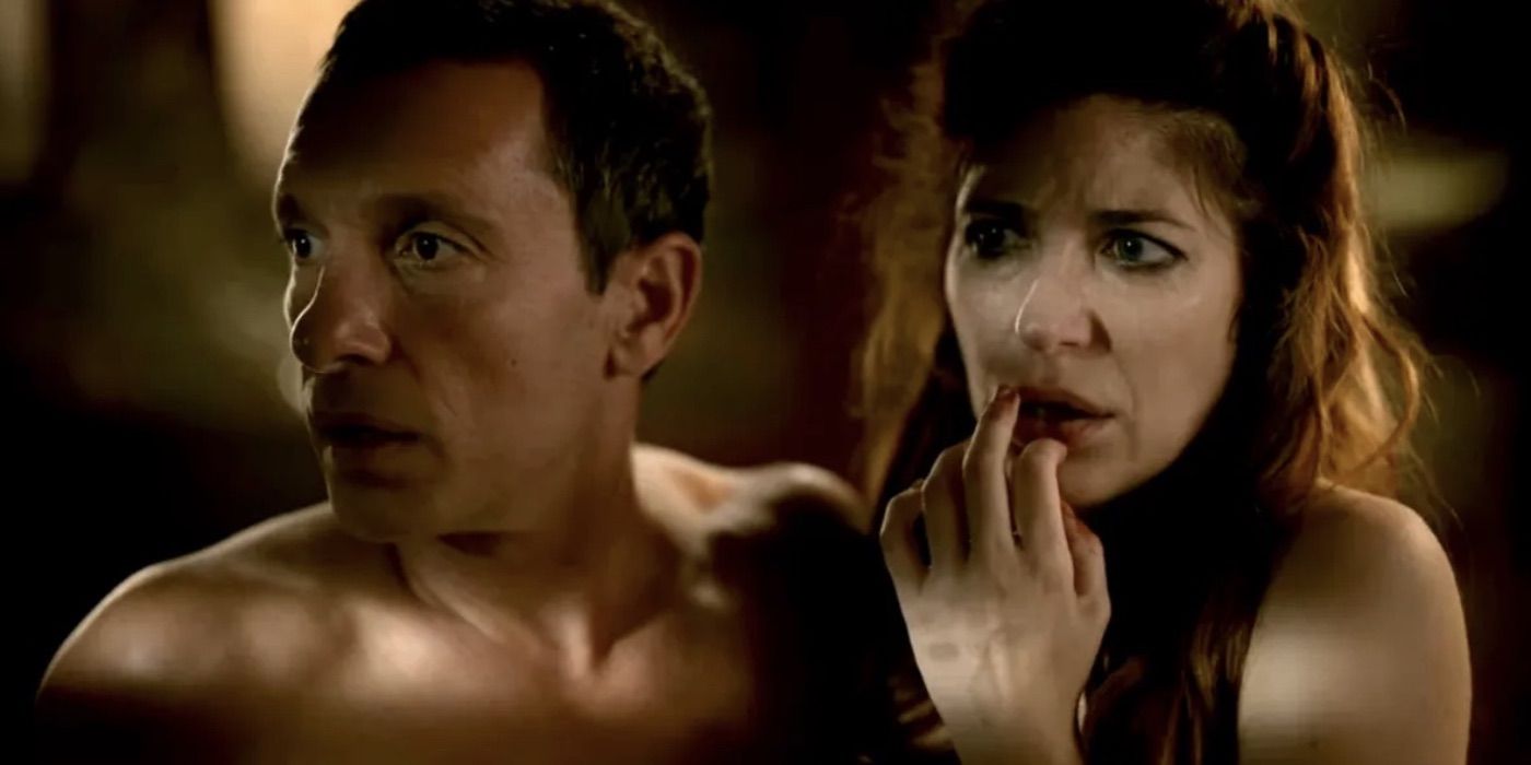 Close up of Sara and David, played by actors Marina Gatell and Pablo Derqui, looking worried in Two (2021)