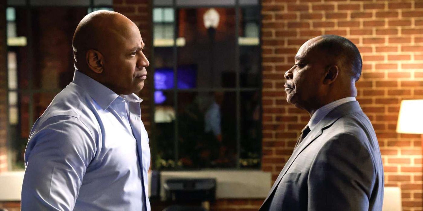Sam Hanna (LL Cool J) and Leon Vance (Rocky Carroll) staring at each other in NCIS.