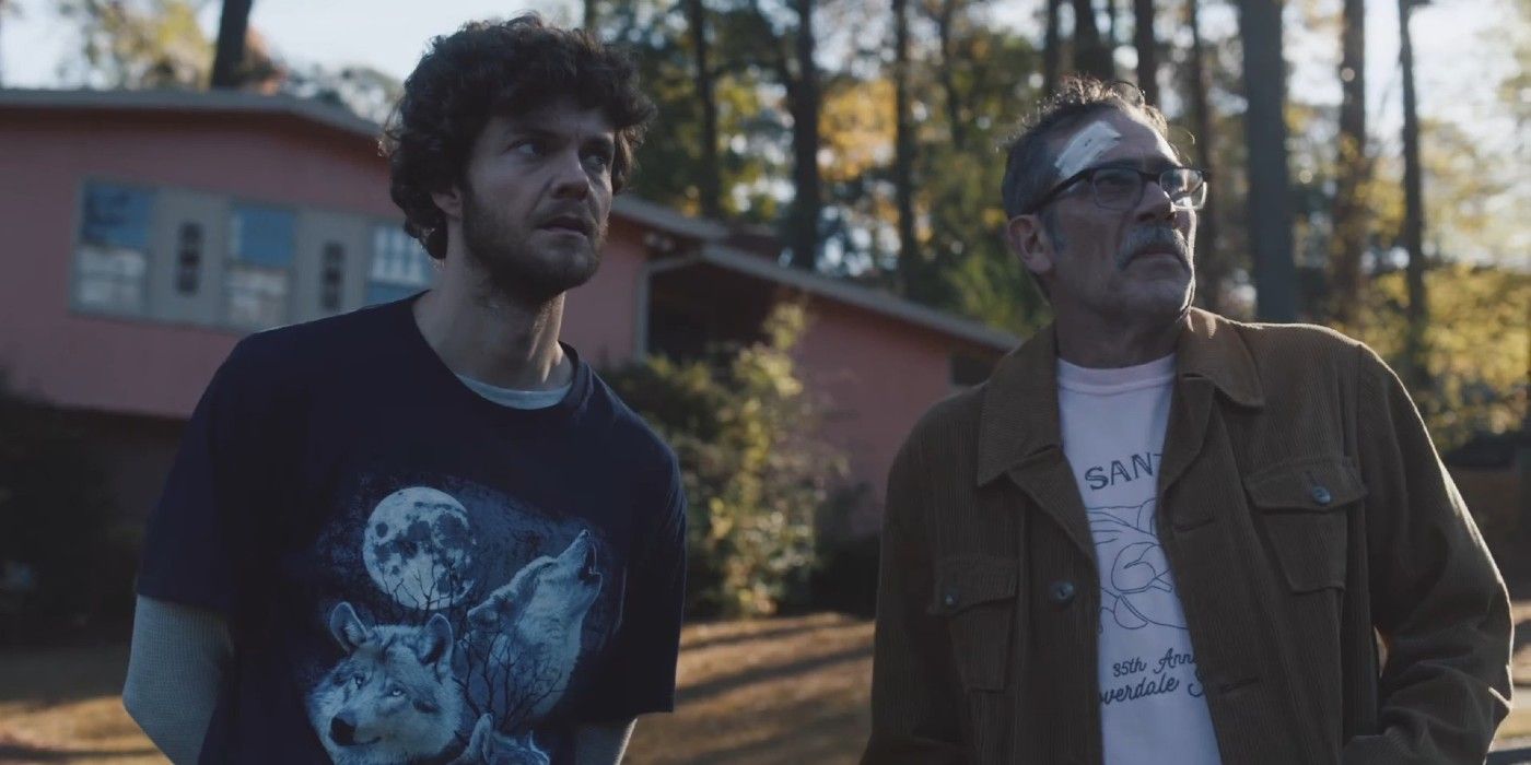 Simon McNally (Jack Quaid) and Ed Deerman (Jeffrey Dean Morgan) standing outside in &lsquo;Neighborhood Watch&rsquo;
