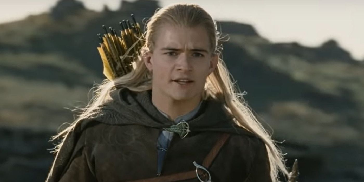 Orlando Bloom as Legolas in 'The Lord of the Rings - The Two Towers' looking into the distance on a plane.
