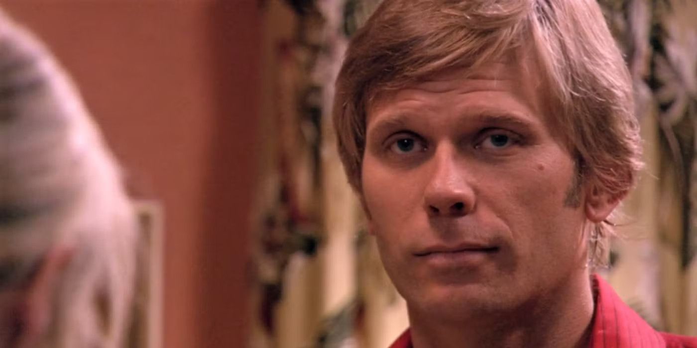 Paul looks at Rita in Dexter.