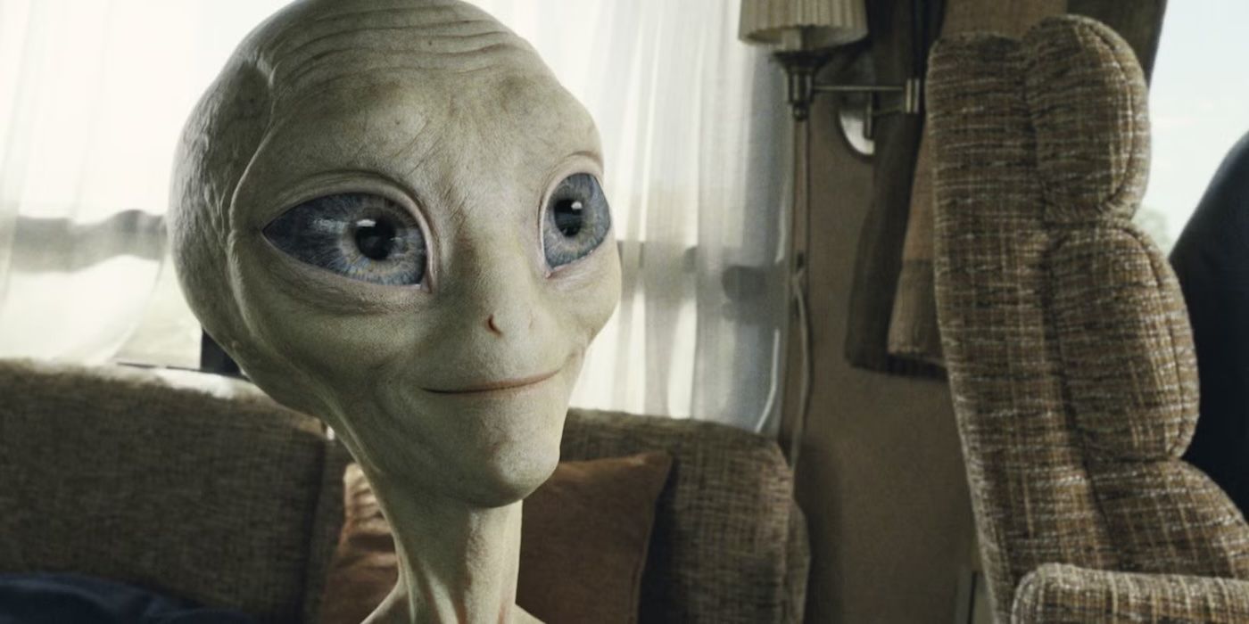 Paul, an alien voiced by Seth Rogan, sitting on a sofa and smiling in Paul.