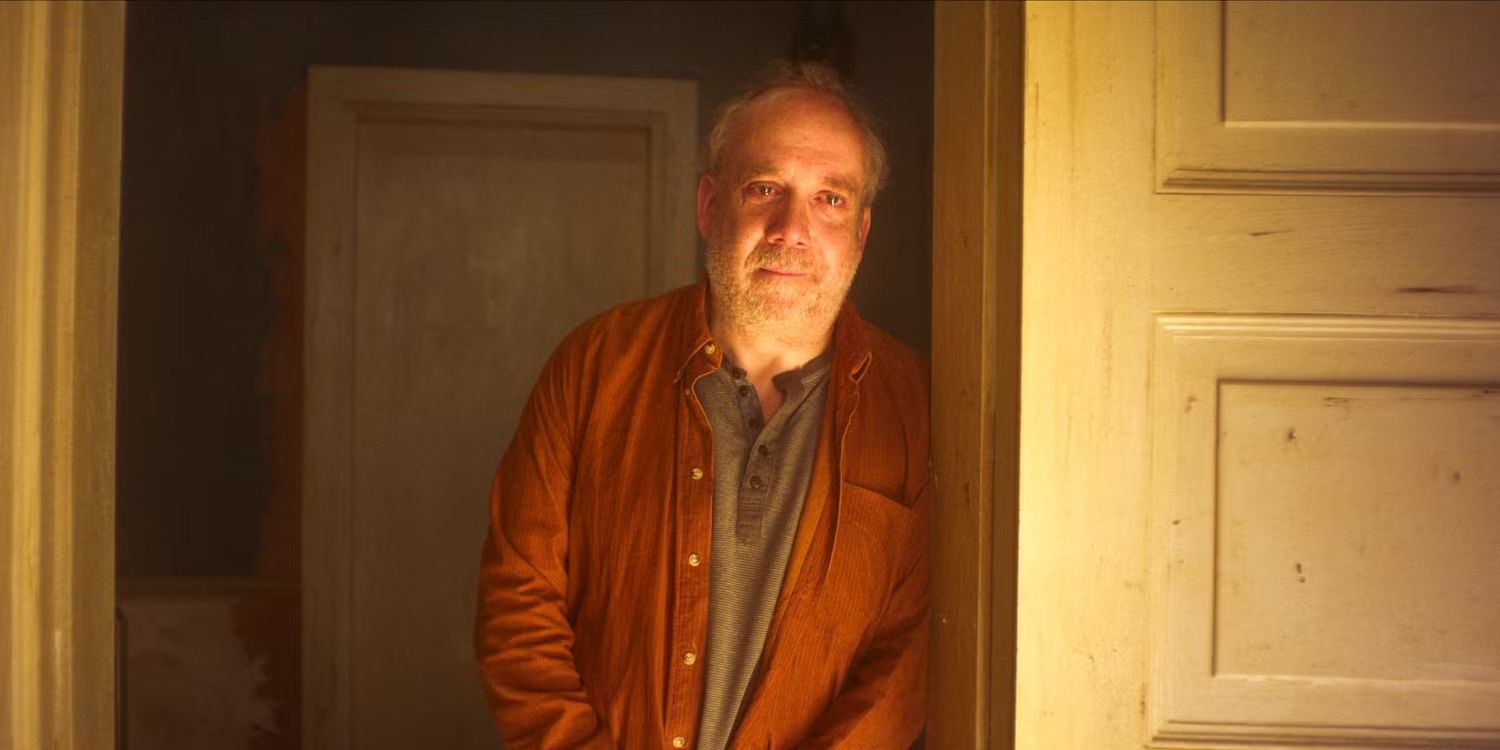 Phillip (Paul Giamatti) leans against a doorway, reflecting in &ldquo;Eulogy,&rdquo; &lsquo;Black Mirror&rsquo;.