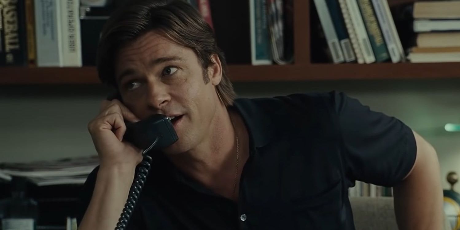 Brad Pitt on the phone in Moneyball.