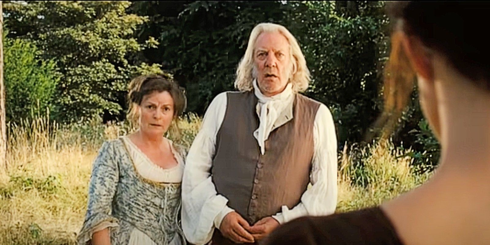 Mr. and Mrs. Bennet talking to Lizzie in Pride and Prejudice 2005.