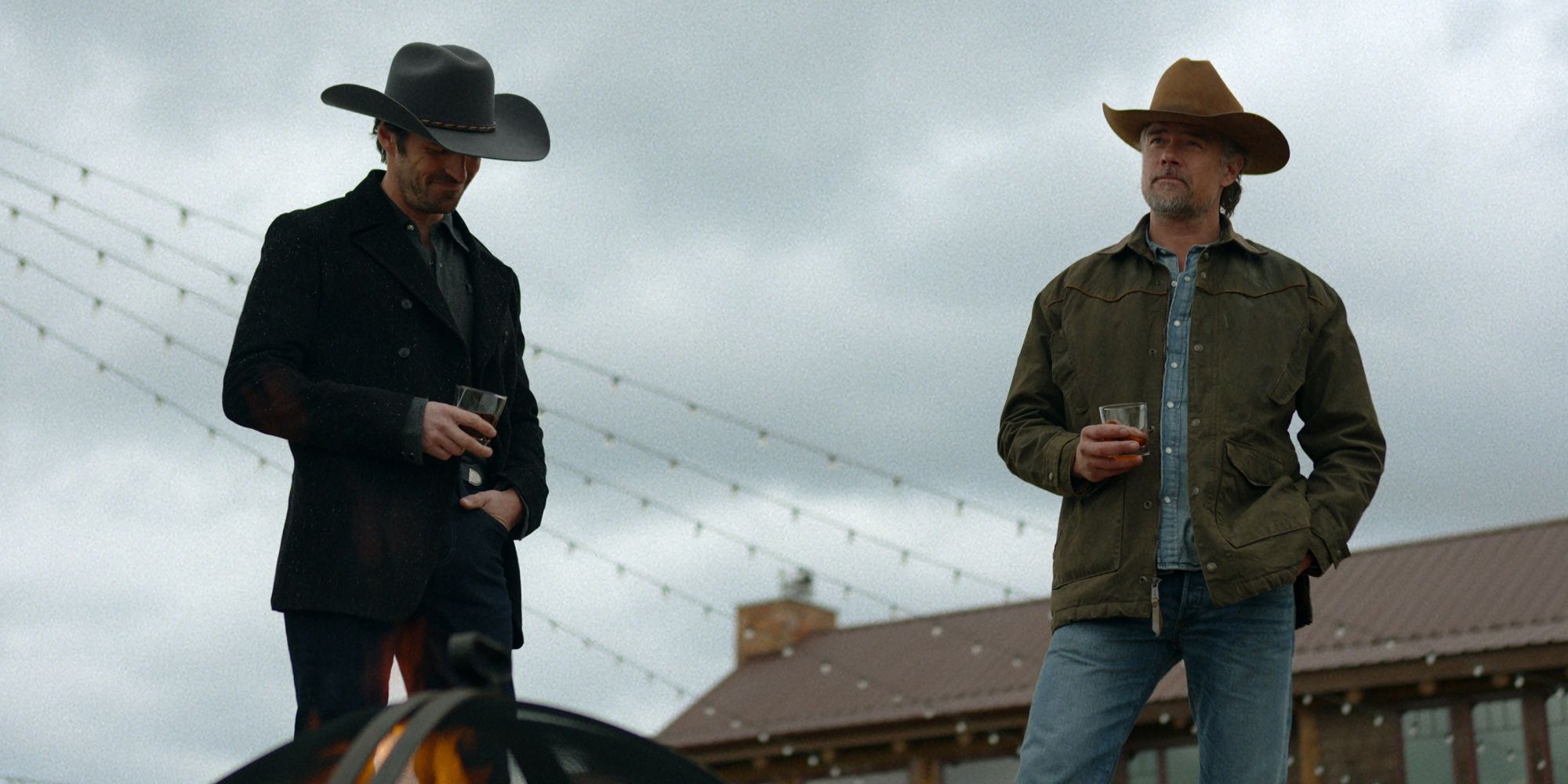 Eoin Macken as Davis Collins standing outside with Josh Duhamel as Staten in cowboy hats in Ransom Canyon