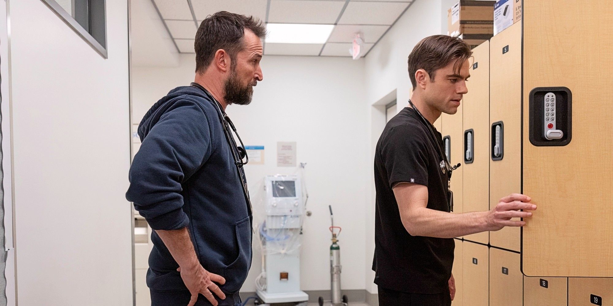 Robby and Langdon standing by the lockers together in The Pitt Season 1.