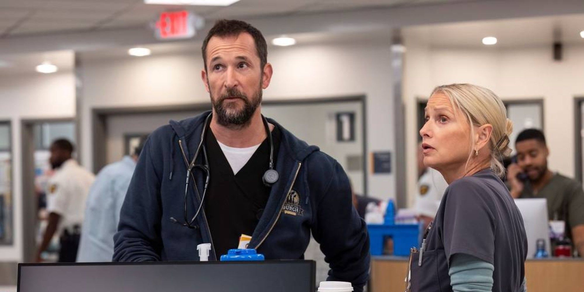 Dr. Robby and Dana Evans standing next to each other and looking concerned in The Pitt.