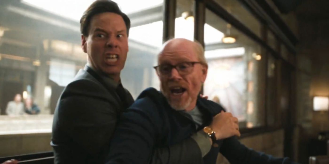 Ike Barinholtz and Ron Howard as Sal holding back Ron Howard screaming in &lsquo;The Studio&rsquo;