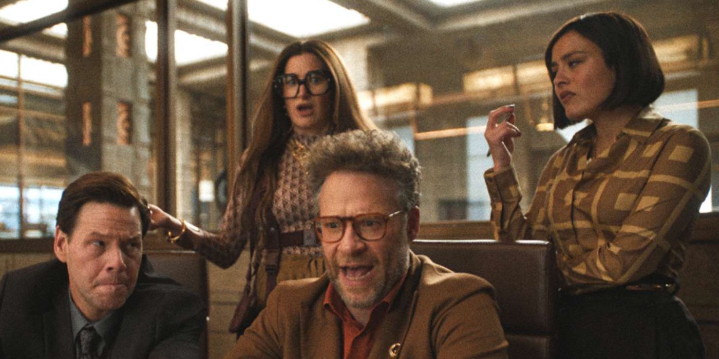 Ike Barinholtz, Kathryn Hahn, Seth Rogen as Sal, Maya, and Matt sitting down in a room yelling in &lsquo;The Studio&rsquo;