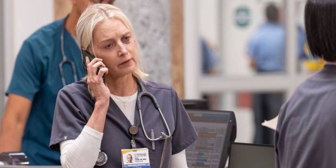 Katherine LaNasa as Dana Evans on the phone in scrubs in the ER in 'The Pitt'