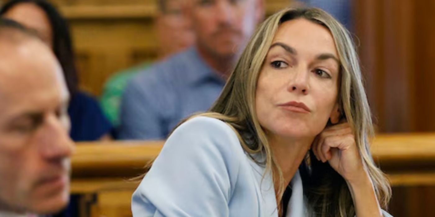 Karen Reed wearing a blue blazer sitting in court in &lsquo;A Body in the Snow: The Trial of Karen Reed.'