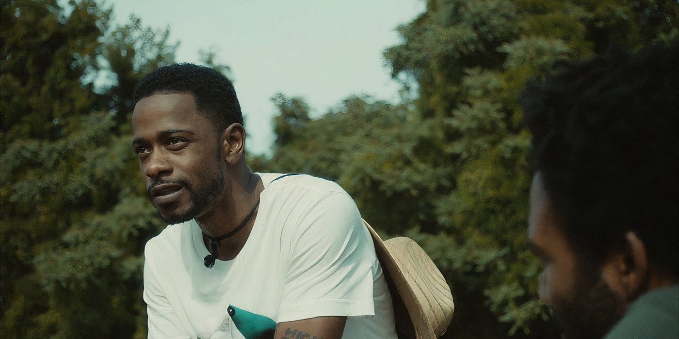 LaKeith Stanfield as Darius sits on a couch outside talking about spending money in Atlanta&rsquo;s &ldquo;The Jacket&rdquo;