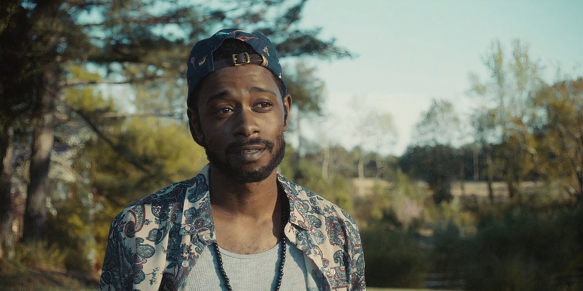 LaKeith Stanfield as Darius standing outside in Atlanta, season 2, episode 4 &ldquo;The Streisand Effect.&quot;