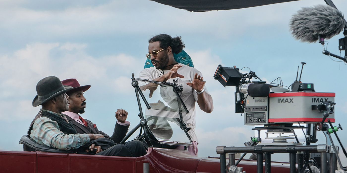 Ryan Coogler directing actors in front of cameras on the set of Sinners.