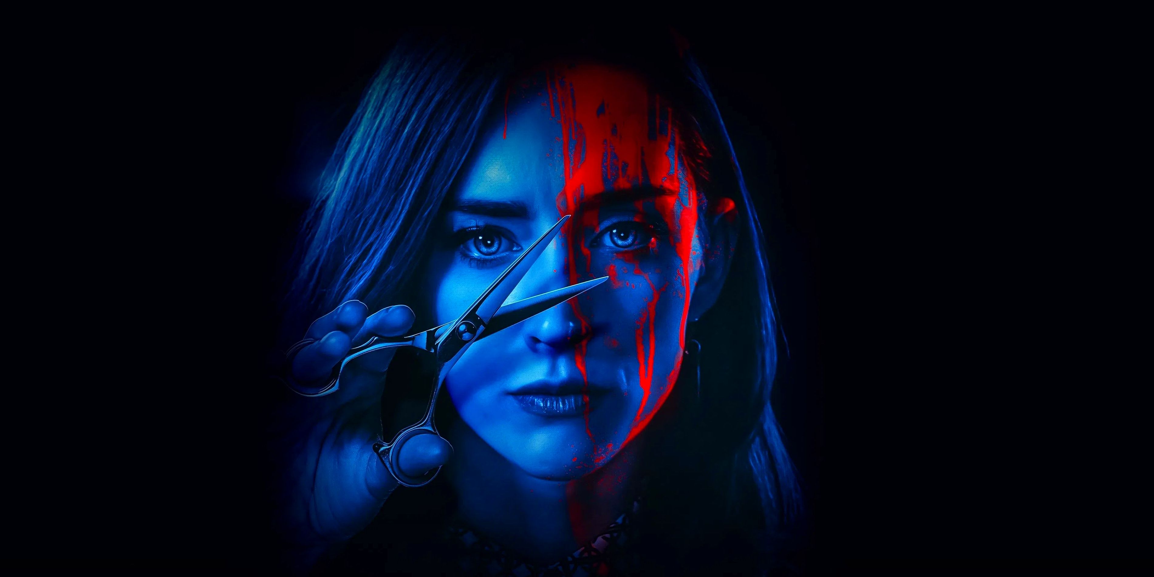 Actor Najarra Townsend as Claire, holding a pair of scissors in front of her blood-streaked face, in a blue light in The Stylist.