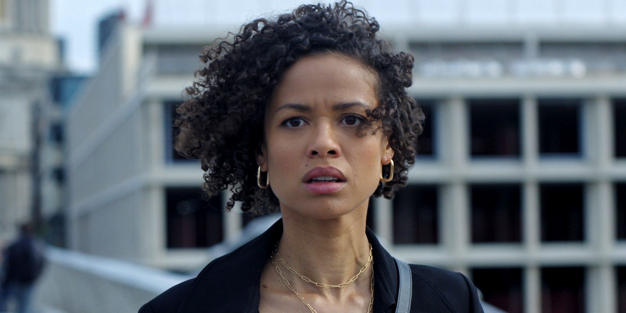 Gugu Mbatha-Raw as Sophie outside looking concerned with her hair blowing in Surface Season 2