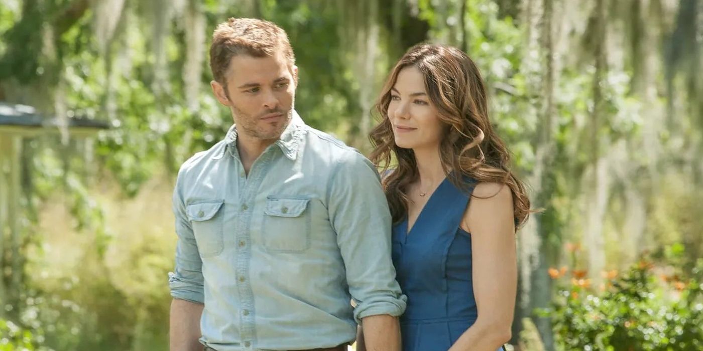 James Marsden and Michelle Monaghan walk outside among trees in The Best Of Me. 