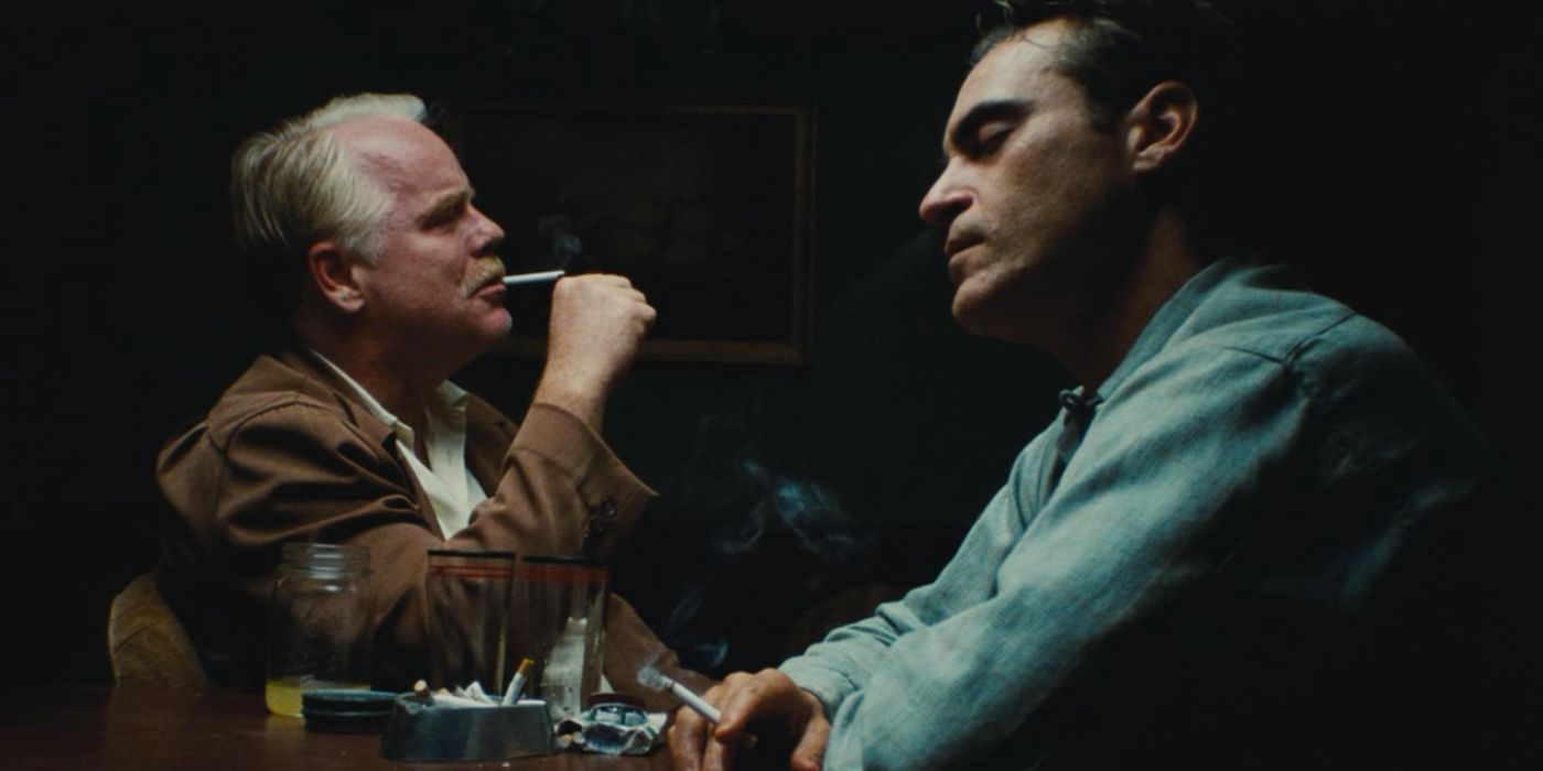 Lancaster Dodd and Freddie Quell in a room sitting in The Master