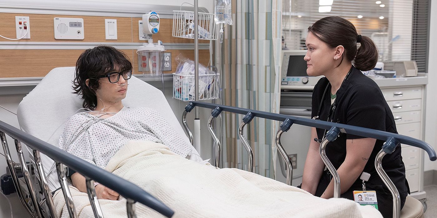 Isa Briones as Dr. Santos talking to Aidan Laprete as a patient in the hospital in The Pitt Season 1, Episode 15.