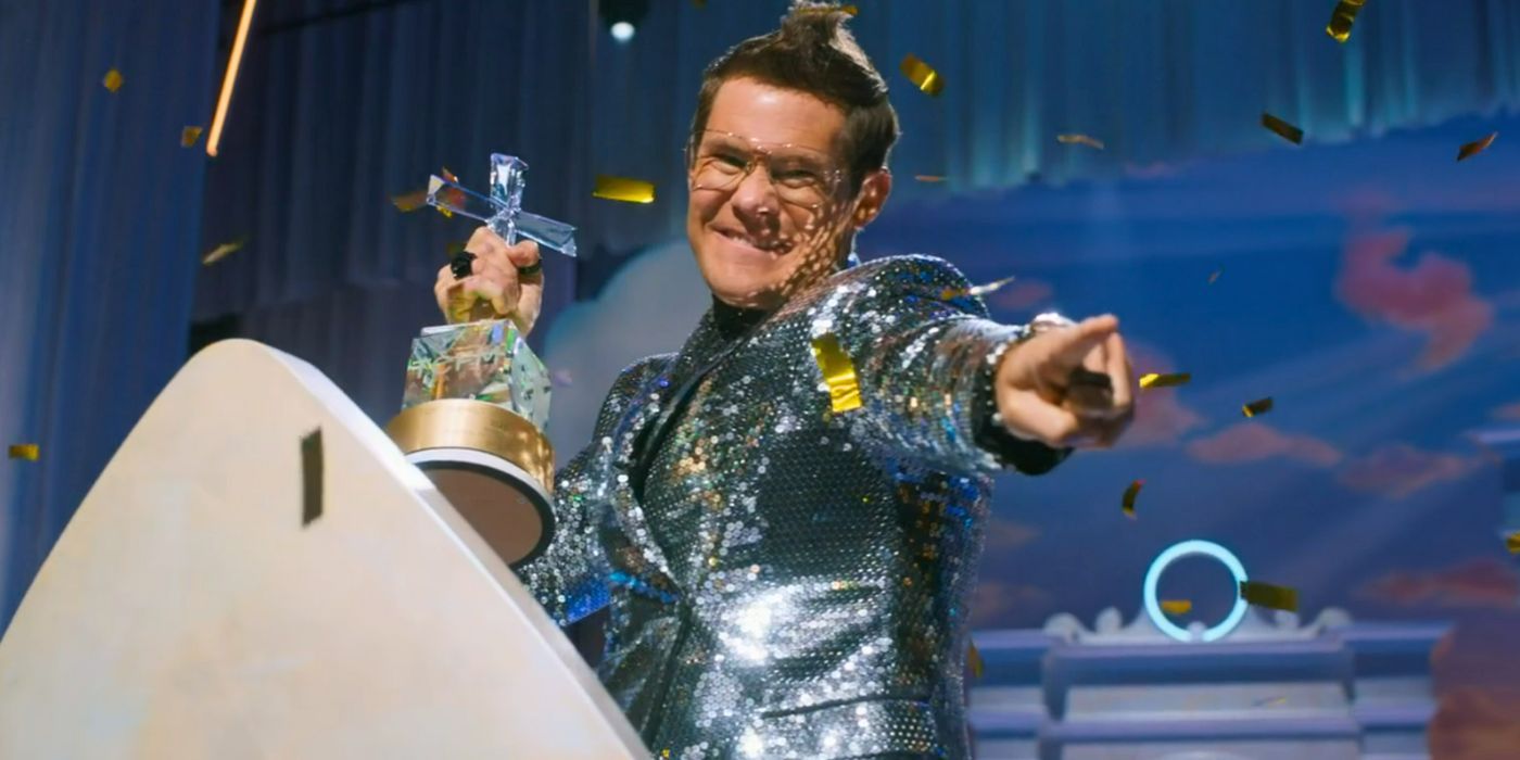 Kelvin points out to the crowd, his other hand holding his Top Christ Following Man Award, as gold confetti falls around him in The Righteous Gemstones