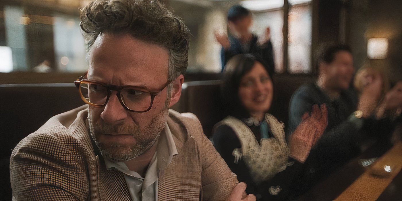 Matt Remick (Seth Rogen) looks humiliated while Ron Howard and his coworkers mock him in The Studio on Apple TV+.