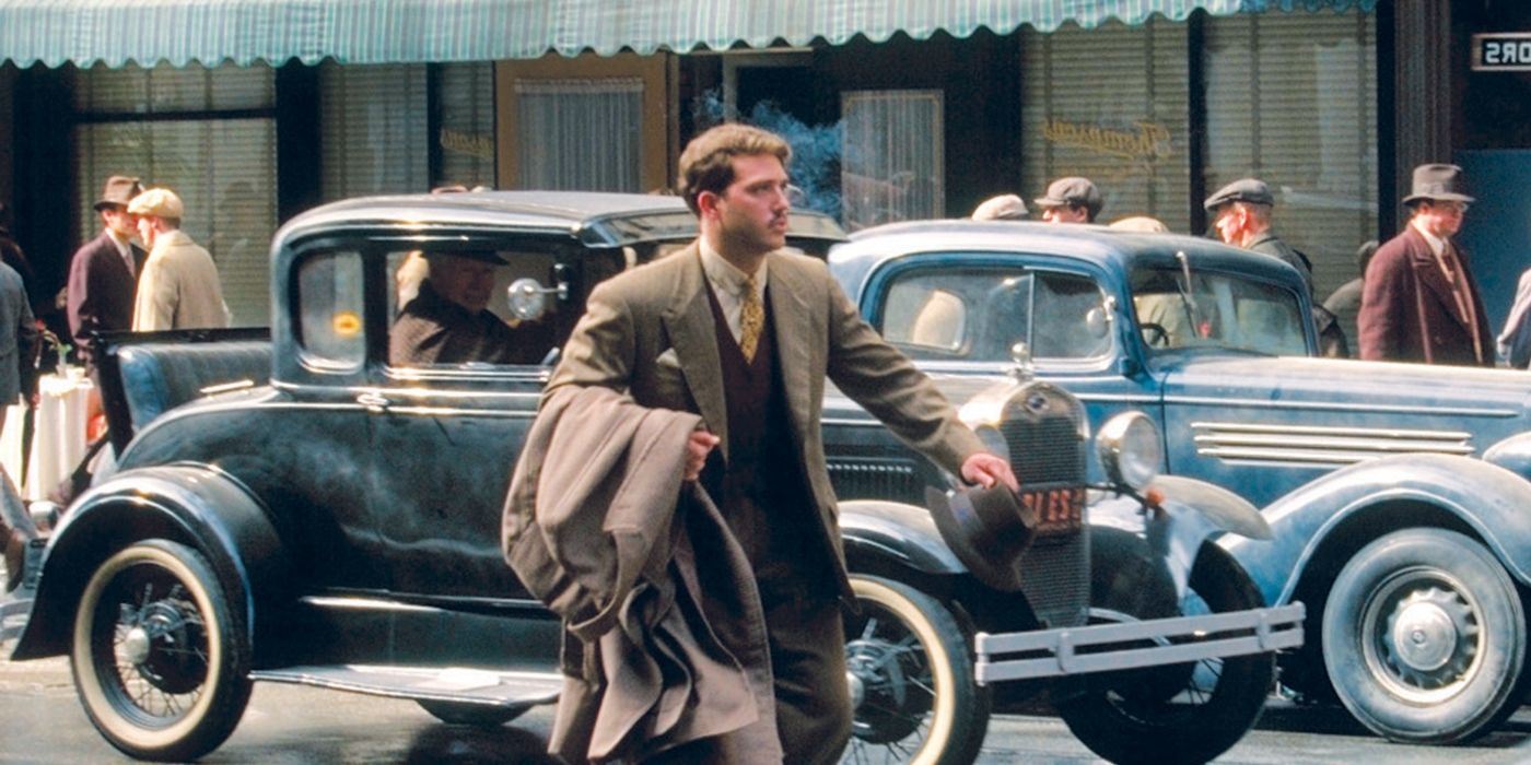 Douglas (Bierko) frantically running in the 1930s simulation