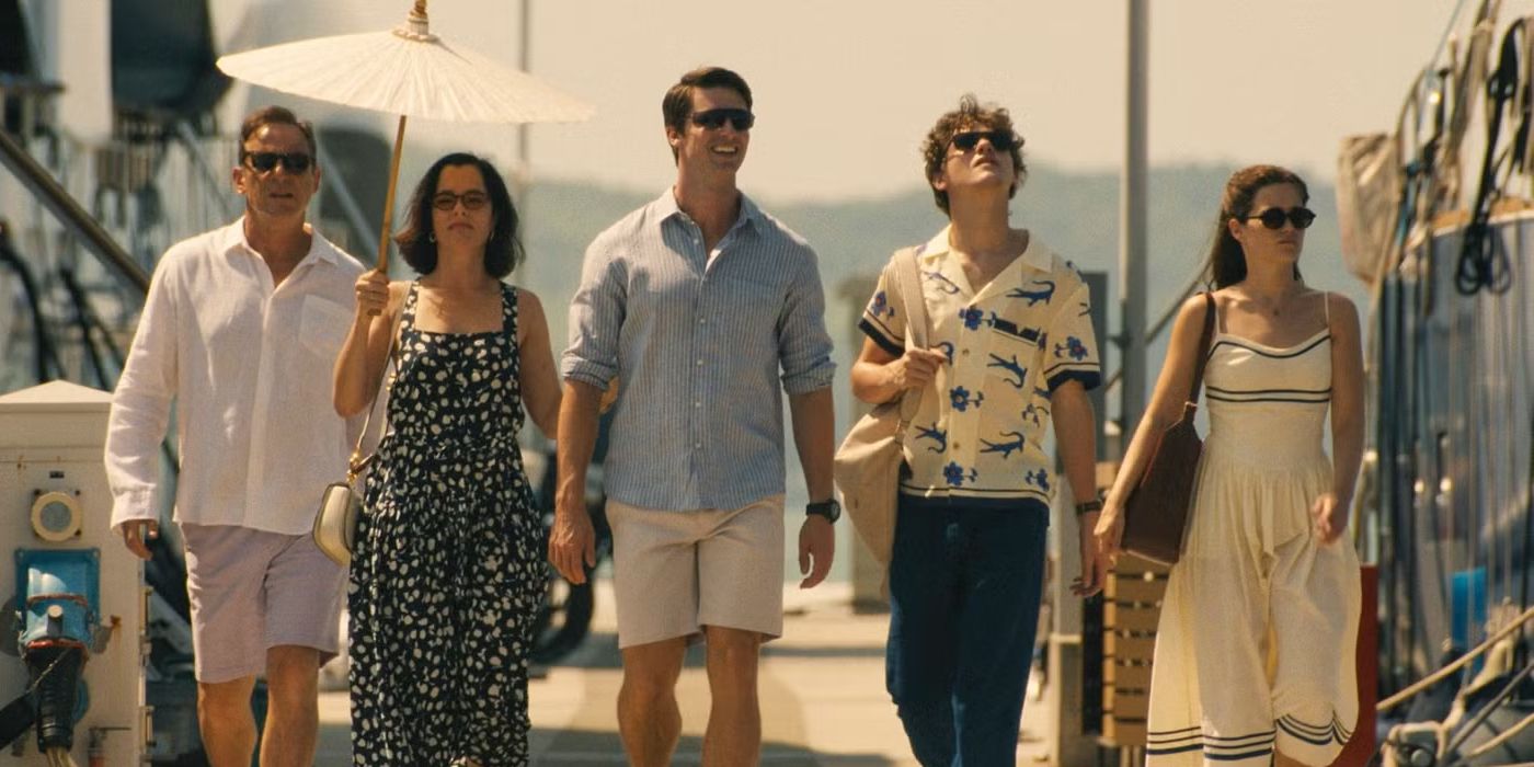 Timothy (Jason Isaacs), Victoria (Parker Posey), Saxon (Patrick Schwarzenegger), Lochlan (Sam Nivola), and Piper (Sarah Catherine Hook) in The White Lotus Season 3.