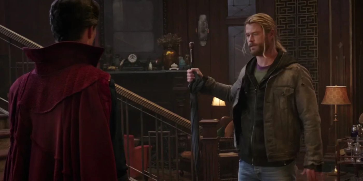 Thor holding an umbrella in front of Doctor Strange in Thor: Ragnarok.